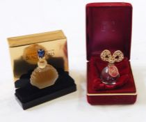 Elizabeth Taylor Diamonds and Rubies bottle, 6.5cm high, with stone set ribbon stopper in red velvet