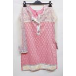 Pink cotton mini dress with cream velvet bodice embroidered with silver and pink net sleeves, the