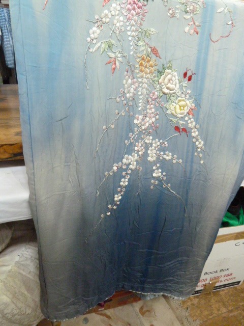 Silk kimono ,heavily embroidered with flowers, wisteria, etc, in pale blue silk; a nylon bed - Image 7 of 8