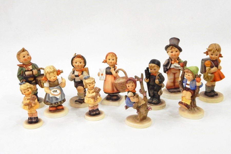 Eleven Goebel Hummel figures of children, incl. boy in top hat, girl with embroidery (af) (11)