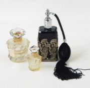 L'ELU by Marquay Paris moulded and cut bottle with floral fabric drawstring pouch 9cm high,