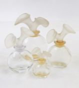 Four various Chloe bottles with lily frosted stoppers, Liz de Liz Paris bottle with flower head