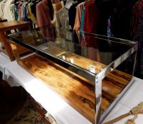 1970's Merrow Associates glass, chrome and rosewood two-tier rectangular coffee table upon