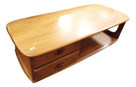 20th century Ercol light elm two-tier coffee table with two drawers between the two tiers, the whole