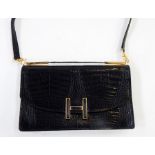 Vintage 1960's black crocodile handbag, labelled Selfridges International Collection, brass coloured