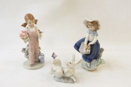 Lladro porcelain figure of girl in bonnet with basket of flowers, 18cm high, another with bird and a