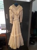 Mid 1980's wedding dress, frills and flounces ( no label) with an gentleman's rust coloured cord