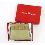 Salvatore Feragamo small evening bag in green with gilt hardware, in original box  Condition
