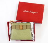 Salvatore Feragamo small evening bag in green with gilt hardware, in original box  Condition