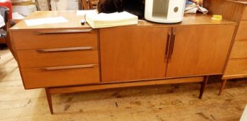 A H McIntosh & Co teak sideboard having three drawers and double-doored cupboard, long bar handles