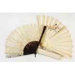 Embroidered fan with bone guards and sticks, embroidered in flowers in tiny chain stitch (not