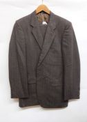 Gentleman's tweed suit made by St Michael; a pair of gentleman's evening trousers; a pair of striped