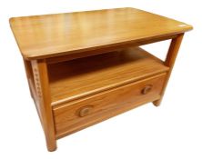 Light elm Ercol two-tier coffee/television table, the rectangular top with rounded corners, with