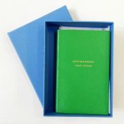 Smythson notebook in emerald green leather, blindstamped 'Inspirations and Ideas', in original blue