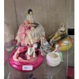 A 1920s pin cushion doll with base, 1920s powderpuff doll with fabric petal decoration, pink glass