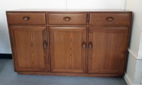 A 20th Century Ercol elm sideboard and tv unitCondition ReportSmall chips to the back, shelf missing