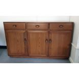 A 20th Century Ercol elm sideboard and tv unitCondition ReportSmall chips to the back, shelf missing