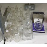 Group of decanters and stoppers to include a pair of cut mallet-shaped decanters with teardrop-