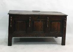 18th century oak coffer with moulded edge above three panels to the front, on style supports,