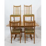 Light Ercol extending dining table with four slat back chairs Condition ReportThere are some small