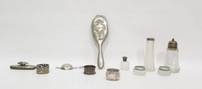 Four silver napkin rings, various, a silver-backed nail polisher, a silver-backed hand mirror (