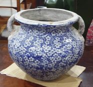 Pottery two-handled large jardiniere, 20th century, transfer-printed with blue and white flowers,