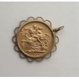 Edwardian sovereign pendant 1906, in pierced scalloped mount  Condition ReportThe weight is approx