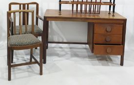 Twentieth century desk, three drawers on cylindrical supports together with two chairs (3)