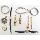 Quantity of lady's watches, various and a black dial compass in a glass casket