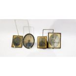 Three 19th century gilt metal photograph frames enclosing photographic portraits and an oval metal