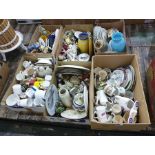 Six boxes of table and collectable ceramics including branded mugs, animal figures, decorative