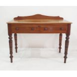 Victorian mahogany writing table with raised ledge back with thumb mould edge, pair short drawers