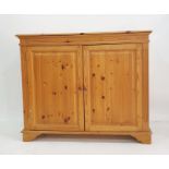 Twentieth century pine cupboard, two doors enclosing shelf, bracket feet 127 x 106.5