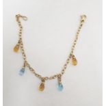 9ct gold and glass drop bracelet, the oval link chain with pale blue and yellow faceted glass