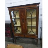 A 19th century mahogany and inlaid display case, with ogee moulded pediment above the swag inlaid