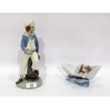 Two Lladro figures, printed blue marks, comprising: a lady sailor modelled seated holding a