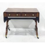 Regency mahogany sofa table with broad kingwood cross-banded border, two frieze drawers with brass