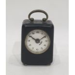 Small metal mounted alarm clock, or gun clock, square section 7 cm high,