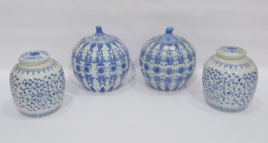 Two pairs of modern Chinese porcelain blue and white vases, comprising: an oviform fluted pair