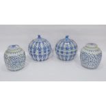 Two pairs of modern Chinese porcelain blue and white vases, comprising: an oviform fluted pair