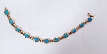 9K gold and opal doublet bracelet with oval links