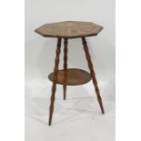 Octagonal olive wood coffee table with ebony and boxwood stringing, marked 'Jerusalem', on three