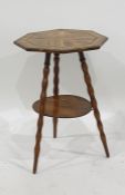 Octagonal olive wood coffee table with ebony and boxwood stringing, marked 'Jerusalem', on three