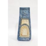 Troika pottery coffin vase of tapered rectangular form with incised decoration, enriched in blue,