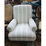 Multi York cream ground armchair on turned front supports, to brass castors