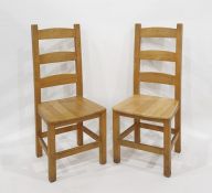 A set of six beech ladderback dining chairs
