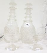 Pair of cut glass mallet shaped decanters and stoppers and a pair of boat-shaped salts, 19th