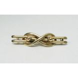 15ct gold bar brooch with knot decoration  Condition ReportThe weight is approx 3.3 g.