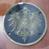 Brass circular plaque possibly from Imperial Prussian Railways train carriage, with large imperial