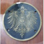 Brass circular plaque possibly from Imperial Prussian Railways train carriage, with large imperial